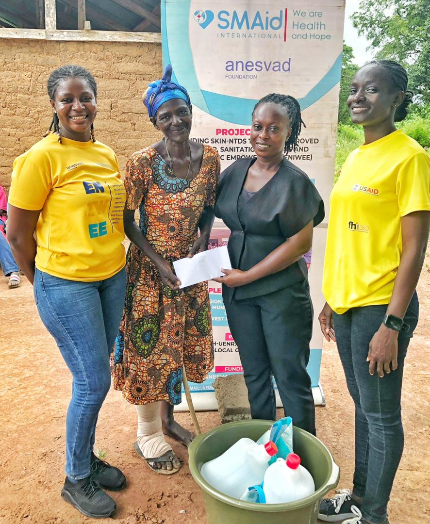 Mad. Abena Mary-NTD beneficiary receiving items at Kwadom