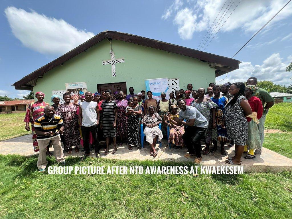 Community support group members gathering in Kwaekesem village