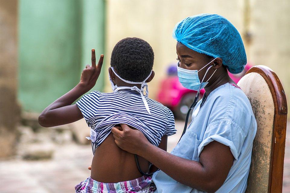 Healthcare worker and child